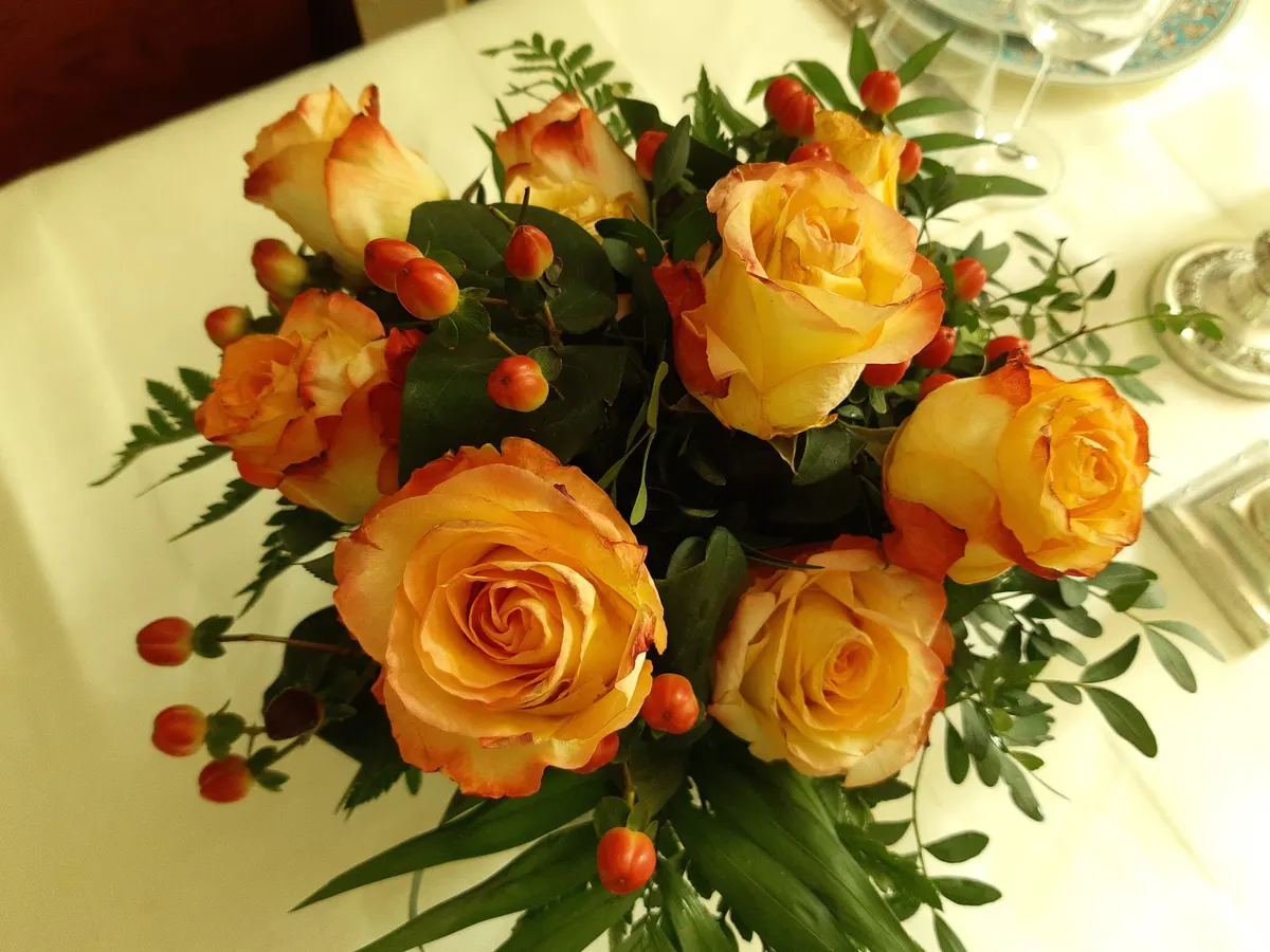 Bouquet of orange and yellow roses for a birthday