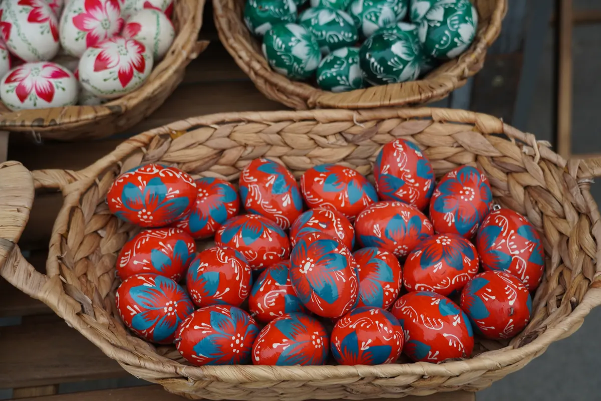 Hand-painted wooden Easter eggs in bright colours