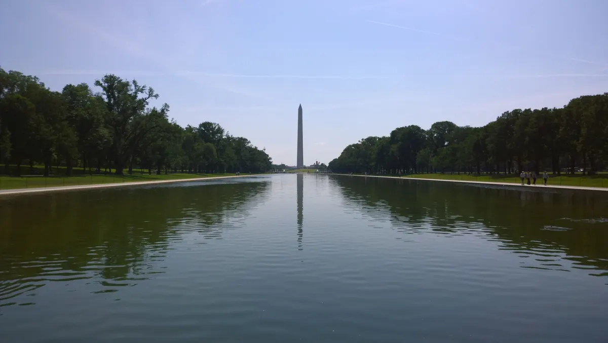 The Washington Monument reflected in the Reflecting Pool on a clear day