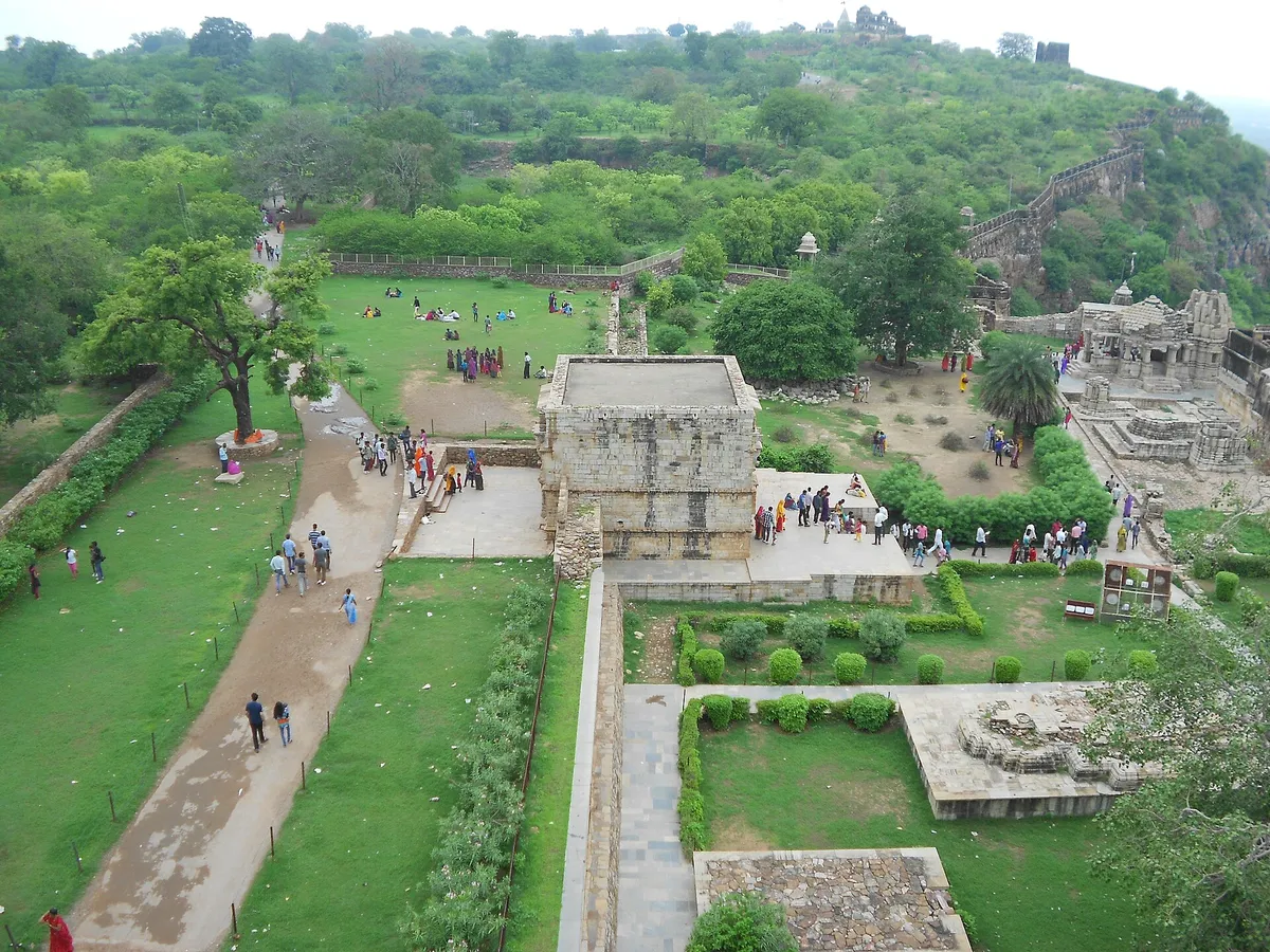 Aerial view of Chittorgarh Fort grounds with old stone ramparts and temples